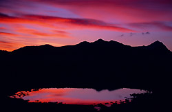 Le coucher de soleil sur le lac de Lauson
